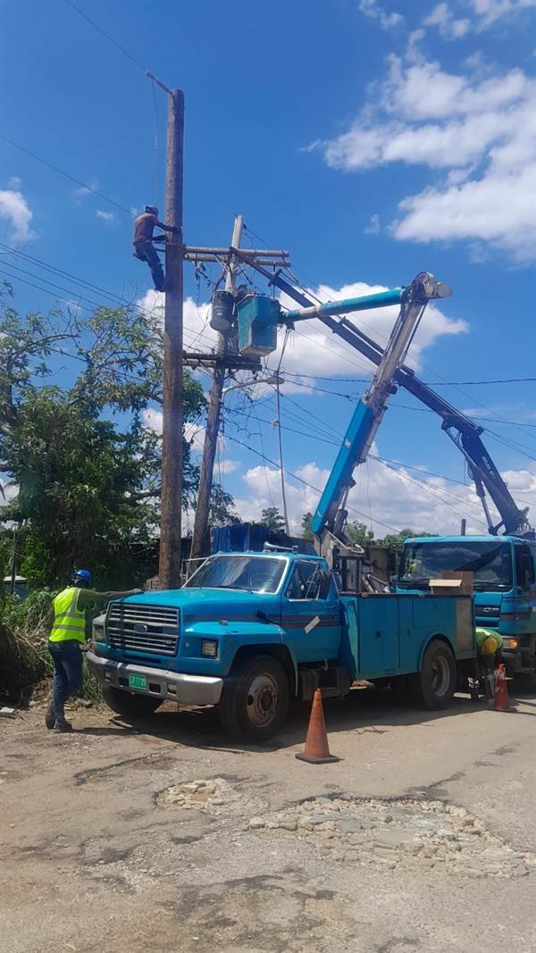 Alcopow crew repairing pole lines during Hurricane Melissa restoration
