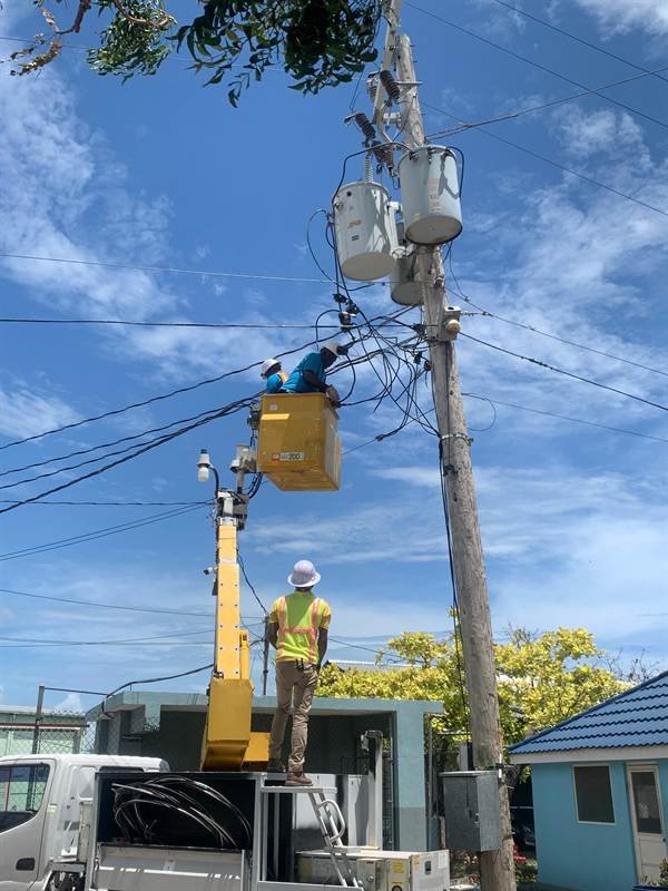 Pole line work at Oil Factory, Clarendon