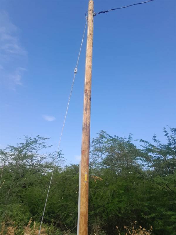Newly erected utility pole for JPSCo